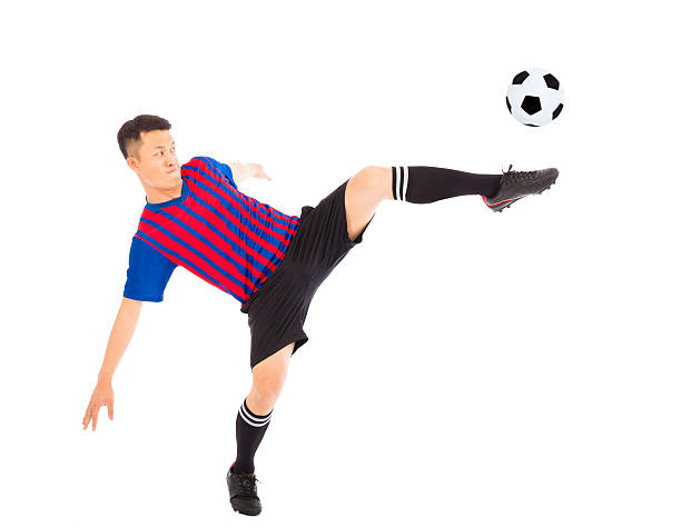 istock Young soccer player Steals the flying ball 495918423