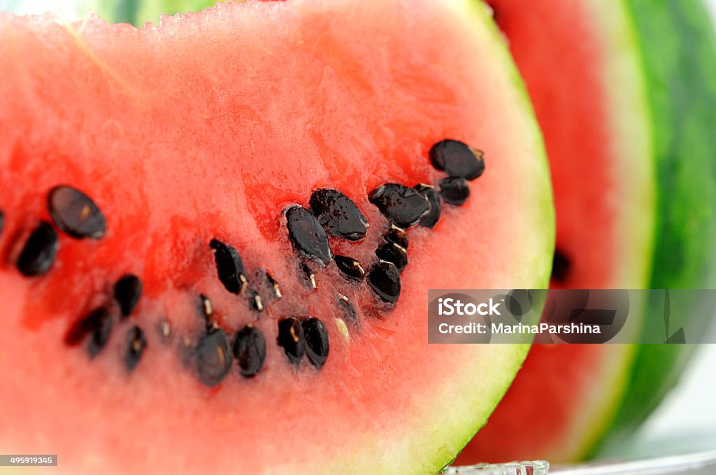 Сlose-up of watermelon Organic piece of watermelon with  large black seeds Black Color Stock Photo