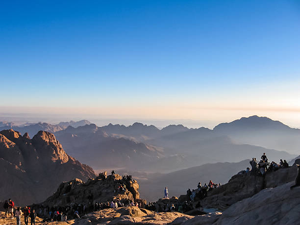 Mount Sinai, Sinai Peninsula, Egypt - October 6,2007: pilgrims waiting for the dawn of the holy summit of Mount Sinai, Aka Jebel Musa, know also as Mount of the Ten Commandments or Mount of Moses.