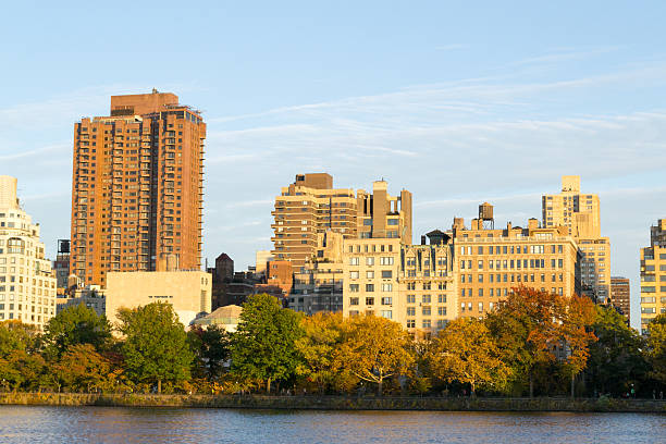 istock Fall season trees by the UES 495923800