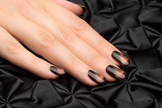 istock Beautiful woman's nails with nice stylish manicure. 495928254