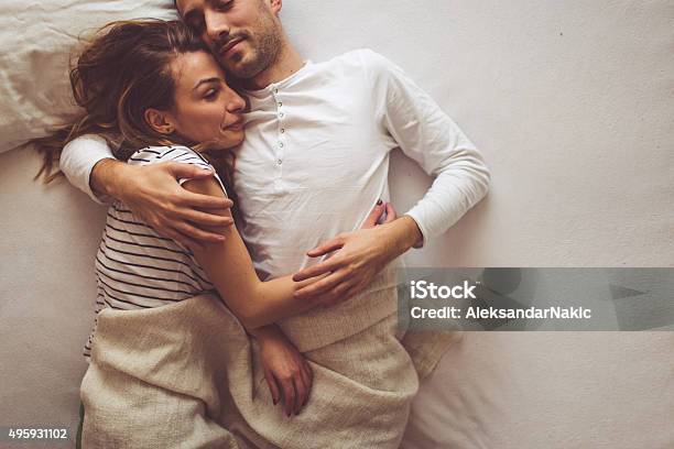 Bedtime Romance Stock Photo - Download Image Now - Bed - Furniture, Couple - Relationship, Happiness