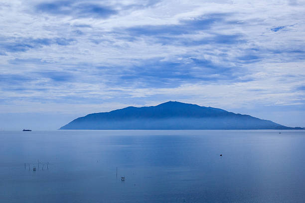 istock Mysterious island in fog 495932854