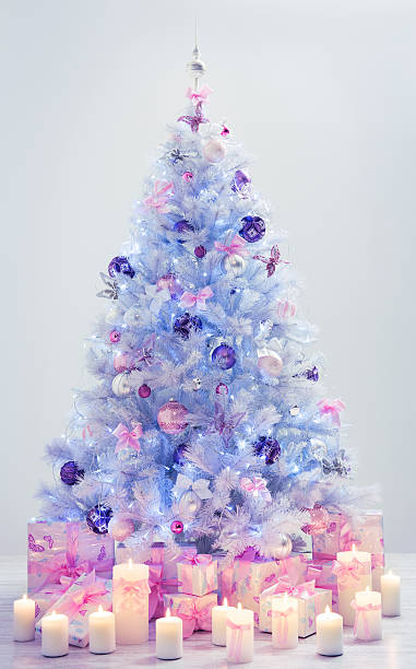Christmas Tree, Decorated Xmas Tree Candles Gifts, Blue White Decoration Christmas Tree and Presents, Decorated Xmas Tree Candles Gifts on Blue Background with Decorative Balls pink christmas tree stock pictures, royalty-free photos & images
