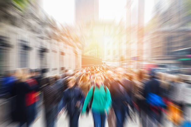 picture of moving people in the pedestrian area of the city with zoom effect