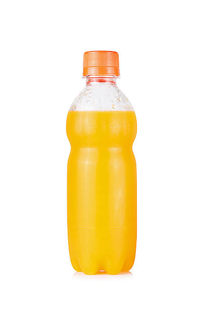 istock Orange juice bottle Isolated on white background 495950854