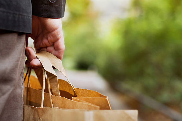 fondo de compras - paper bag packaging blank package fotografías e imágenes de stock