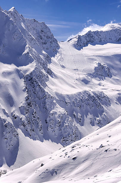 Ski area on Rettenbach Glacier, Solden, Austria Ski tow and steep run on Rettenbach Glacier in Solden ski resort in Otztal Alps in Tirol, Austria rettenbach glacier stock pictures, royalty-free photos & images