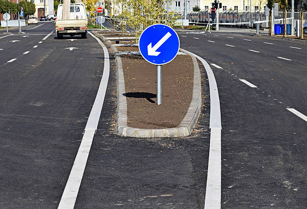 istock Arrow sign at the road crossing 495958414