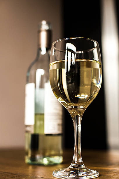 Glass of white wine. stock photo