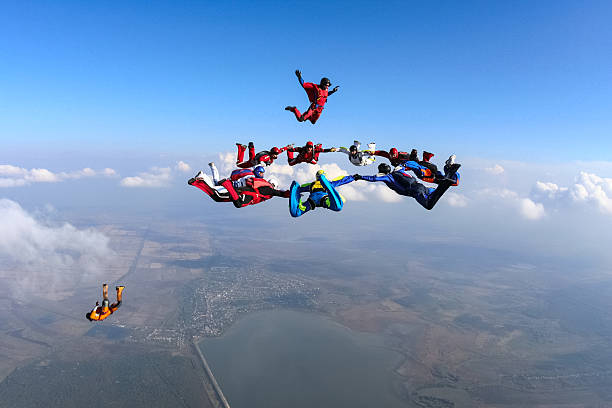 Skydiving photo. Building a group of paratroopers ring in free fall. drill team stock pictures, royalty-free photos & images