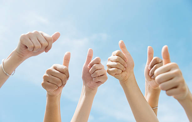 istock Group of people giving thumbs up 495981174