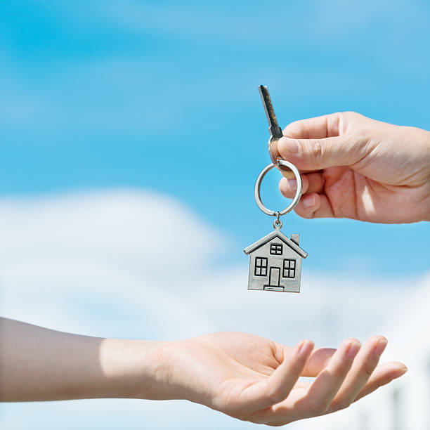 istock Handing over the house keys 495983864