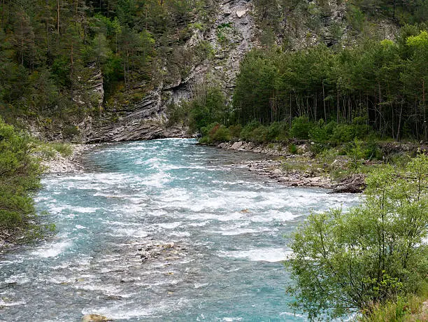 France: the Ubaye river along the road to the Col du Larche, in the Provence-Alpes-Cote-d'azur region (French Alps), at june