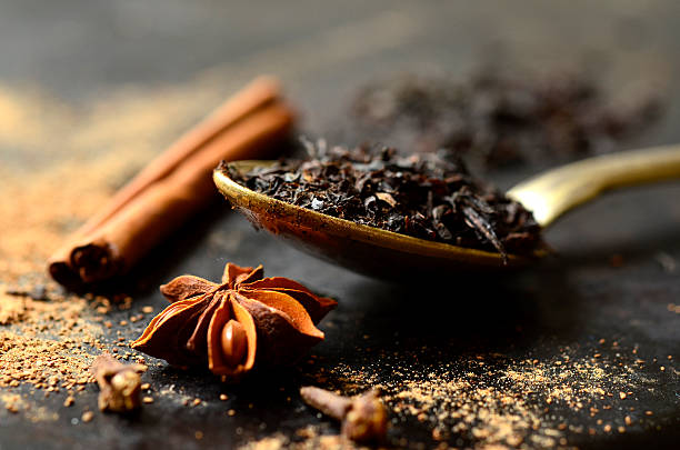 Ingredient for making tea masala. Ingredient for making spicy indian tea masala. chai stock pictures, royalty-free photos & images