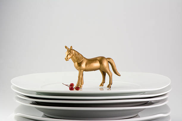 White Plates stacked dishes and clean white horse and gold tableware, conceptual food