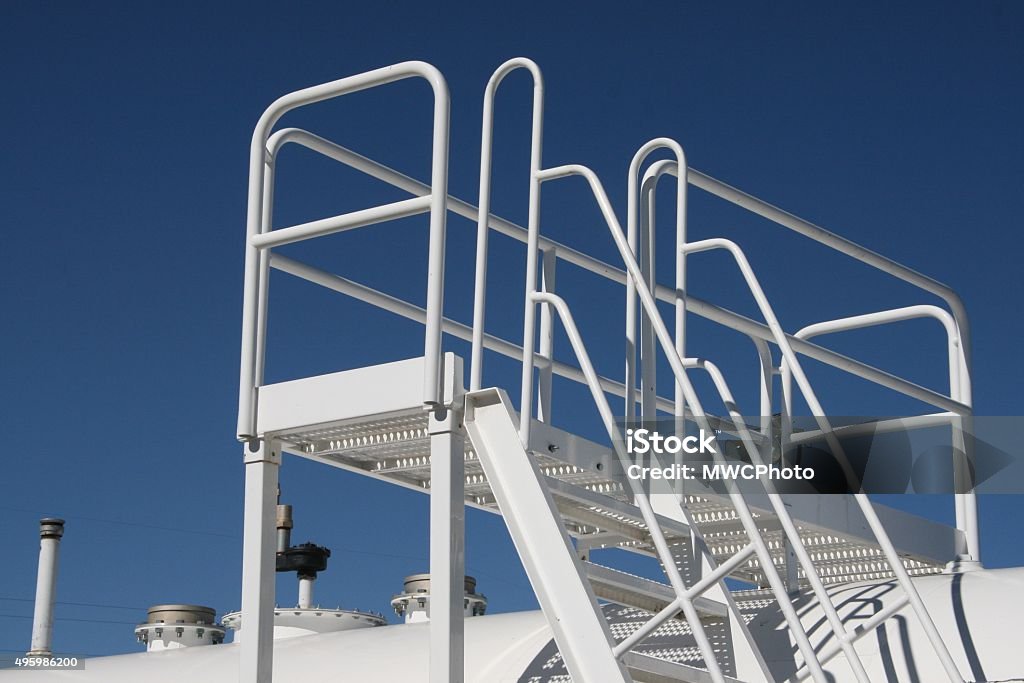 Railings Railings and steps on top of a large fuel tank. 2015 Stock Photo