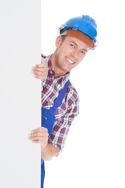 istock Happy Male Worker With Placard 495986222