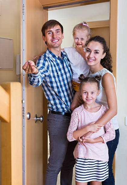 istock Middle class family in new house 495987646