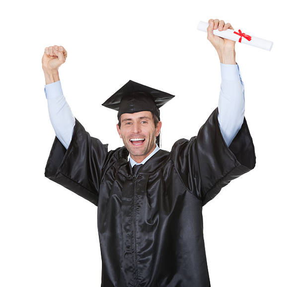 istock Portrait of happy graduate student cheering 495987968