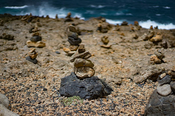 istock Stone piles in front of a stormy sea 495988204