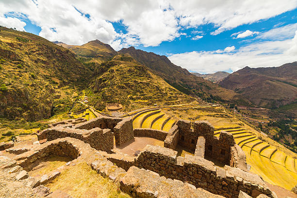 istock Inca terraces and building ruins in Pisac, Sacred Valley, Peru 495989936