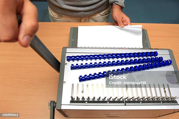 Male Man Binding Pages At Table In Paper Store Stock Photo - Download Image Now - 2015, Adult, Art And Craft