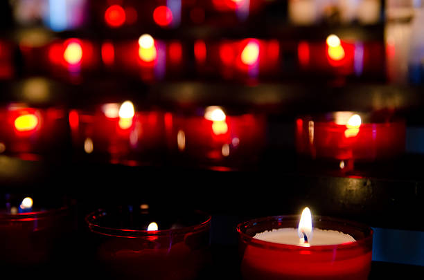 istock candles in church 495991696