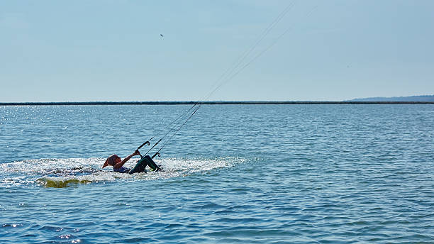 istock young woman kite-surfer 496025606