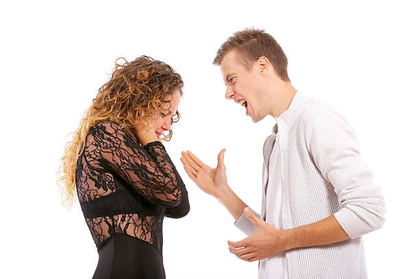 gniew, związek problemy, przemoc domowa - couple indoors studio shot horizontal zdjęcia i obrazy z banku zdjęć