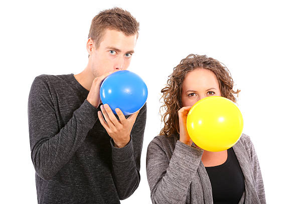 istock young couple with ballons 496028608
