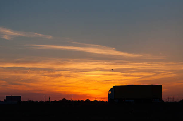 istock Sunset view and a truck 496031171