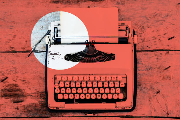 Retro typewriter on a wooden background