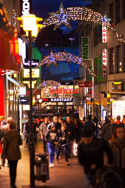 istock Illuminated Limbecker Straoe and shopping people 496032288