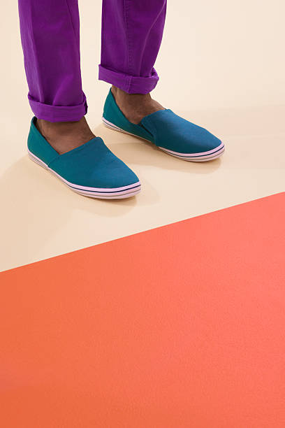 Colours and footwear Cropped shot of footwear on a colourful backgroundhttp://195.154.178.81/DATA/i_collage/pi/shoots/783402.jpg flat shoe photos stock pictures, royalty-free photos & images