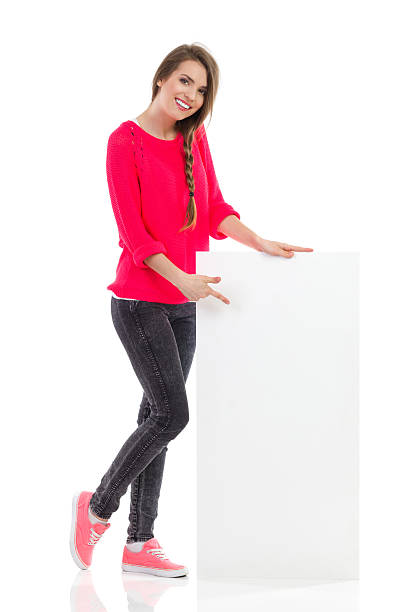 istock Smiling girl and a placard 496032461
