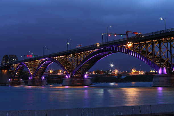 istock Peace Bridge with purple and gold lights 496032865