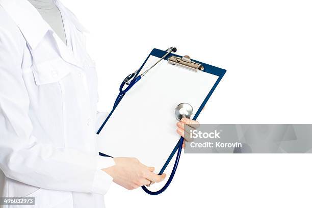 Medical Doctor With Clipboard Isolated On White Background Stock Photo - Download Image Now