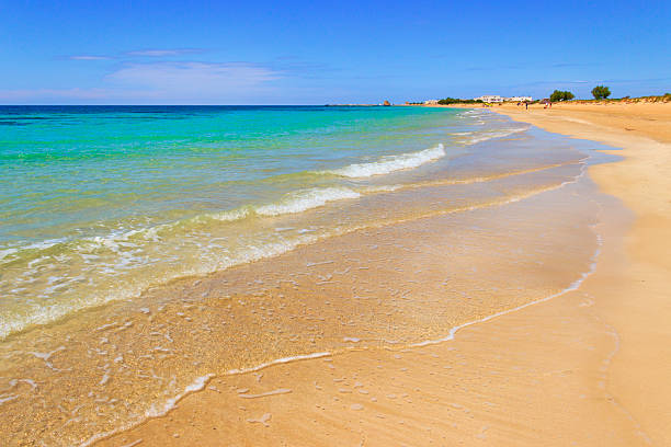 SUMMER.Ionian coast of Salento:beach at Torre Pali (Lecce). ITALY (Apulia) Ionian coast of Salento:Torre Pali.Lecce,-(Apulia) ITALY-Saracen watchtower.From Torre Pali to Pescoluse and Posto Vecchio the shore is made of a so fine white sand and vashed by a so clear sea that it is called 'Maldive of Salento'. puglia beach stock pictures, royalty-free photos & images