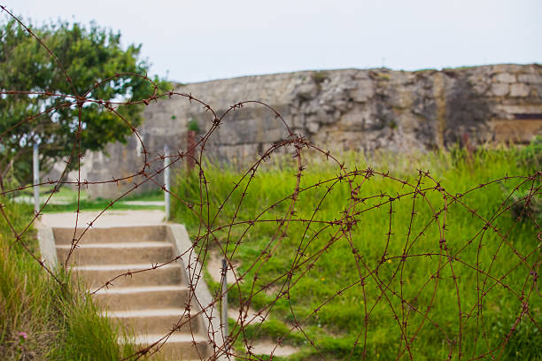 istock Old broken German bunkers of Atlantic Wall on Pointe-Du-Hoc. Wes 496033571