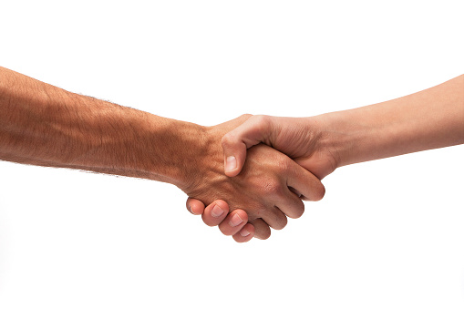 Shaking hands of two male people, isolated on white