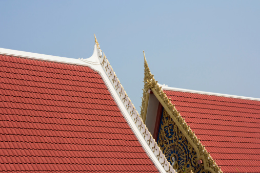 Vientiane, Laos: congregation hall (sim) of Wat Inpeng Voraamahavihanh or “Temple of the Incarnation of Indra”  - Buddhist temple originally built in the 16th century, though the present structure dates from the 19th century  - corner of Khun Bu Lom and Samsenthai streets. Roof crest with \