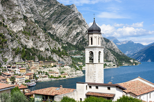 View over the small town Limone sul Garda with the San Benedetto church at the lake Garda (Italy).