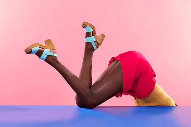 Falling for fashion Cropped shot of footwear on a colourful backgroundhttp://195.154.178.81/DATA/i_collage/pi/shoots/783402.jpg dress shoe photos stock pictures, royalty-free photos & images