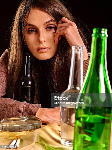 Drunk Girl Holding Bottle Of Vodka Stock Photo - Download Image Now - 2015, Addict, Addiction