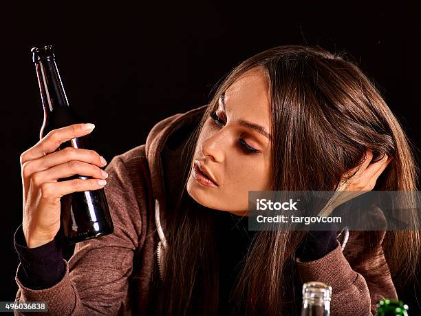 Drunk Girl Holding Bottle Of Vodka Stock Photo - Download Image Now - 20-29 Years, 2015, Activity