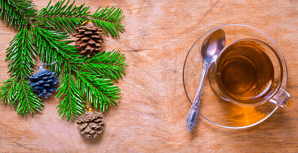 istock Glass Cup of tea on an old rustic table with 496060454