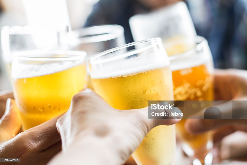 Friends toasting with beer Friends toasting with beer. Beer - Alcohol Stock Photo