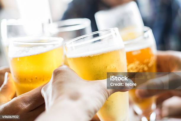 Friends Toasting With Beer Stock Photo - Download Image Now - Beer - Alcohol, Celebratory Toast, Party - Social Event