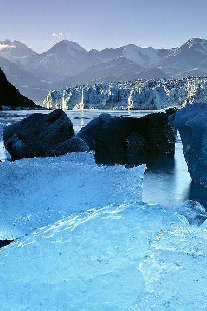 Hubbard Glacier, Alaska with icebergs in sunshine stock photo